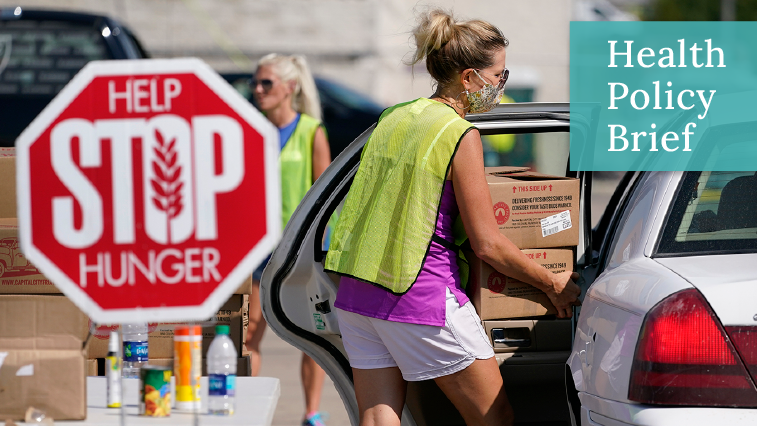 Woman in mask and yellow vest loads boxes of food into car; in foreground, red stop sign reading "HELP STOP HUNGER"; in upper-right corner, teal box reading "Health Policy Brief"