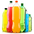 group of plastic bottles without labels containing colorful beverages